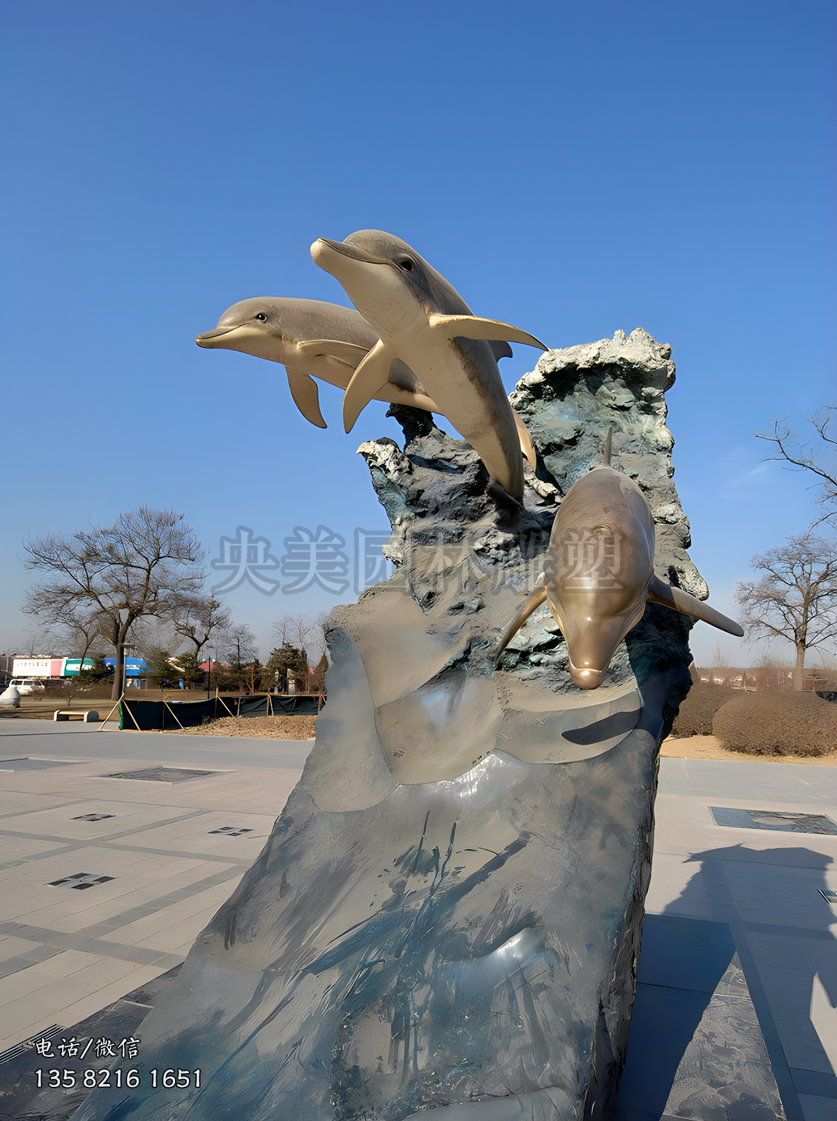 玻璃钢冲浪海豚雕塑