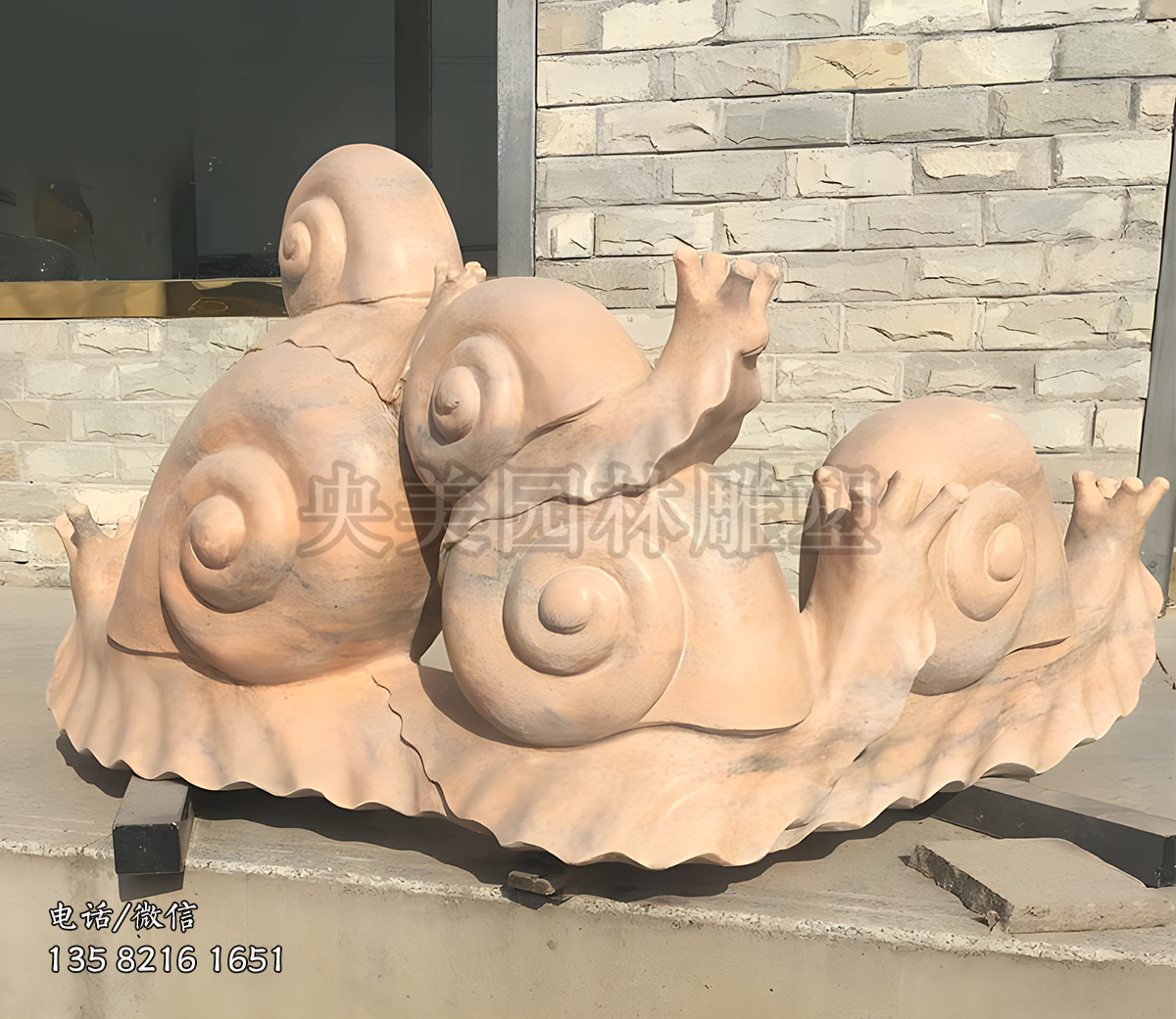 晚霞红蜗牛赢博官网雕塑