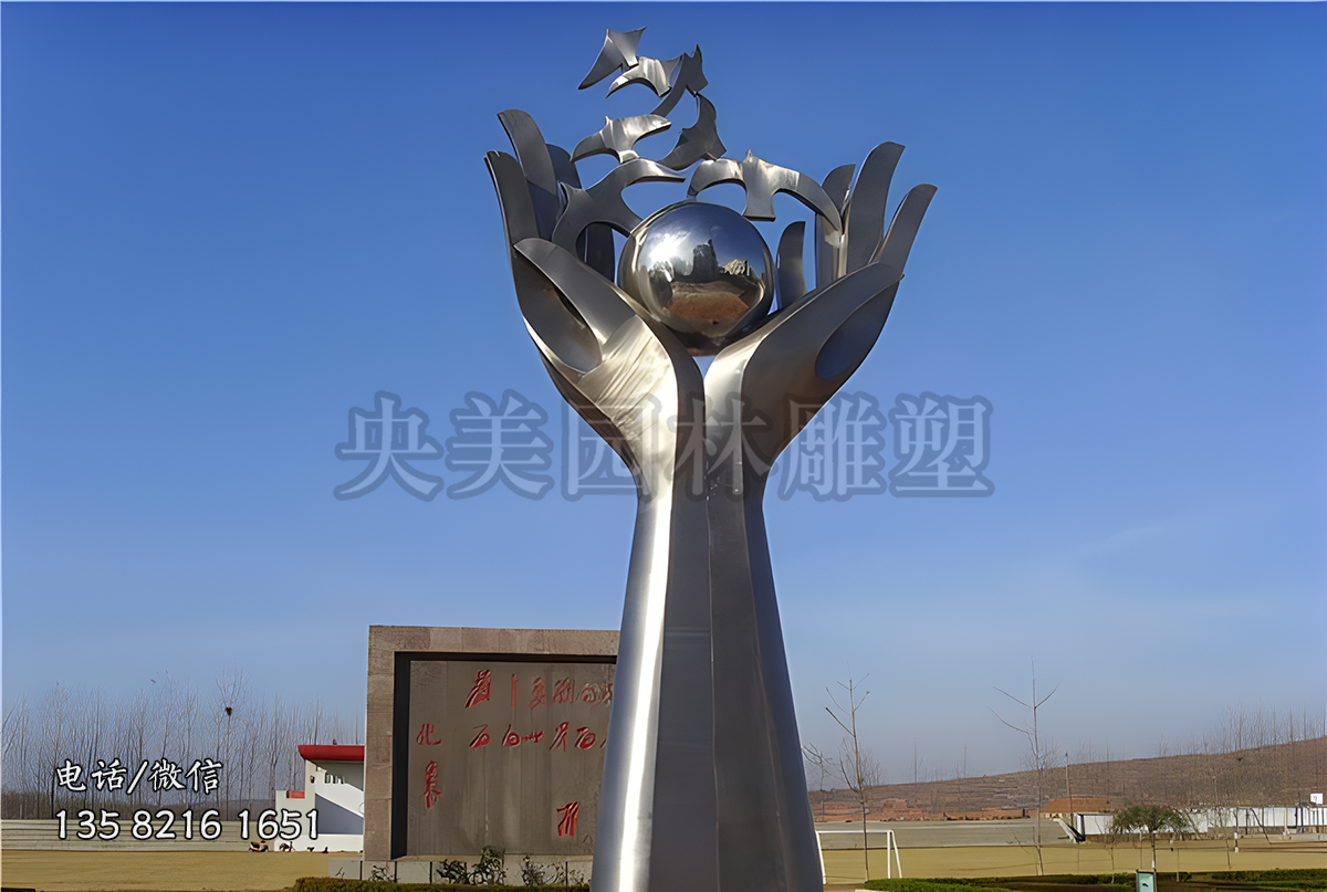 手捧地球和鸽子的不锈钢景观雕塑
