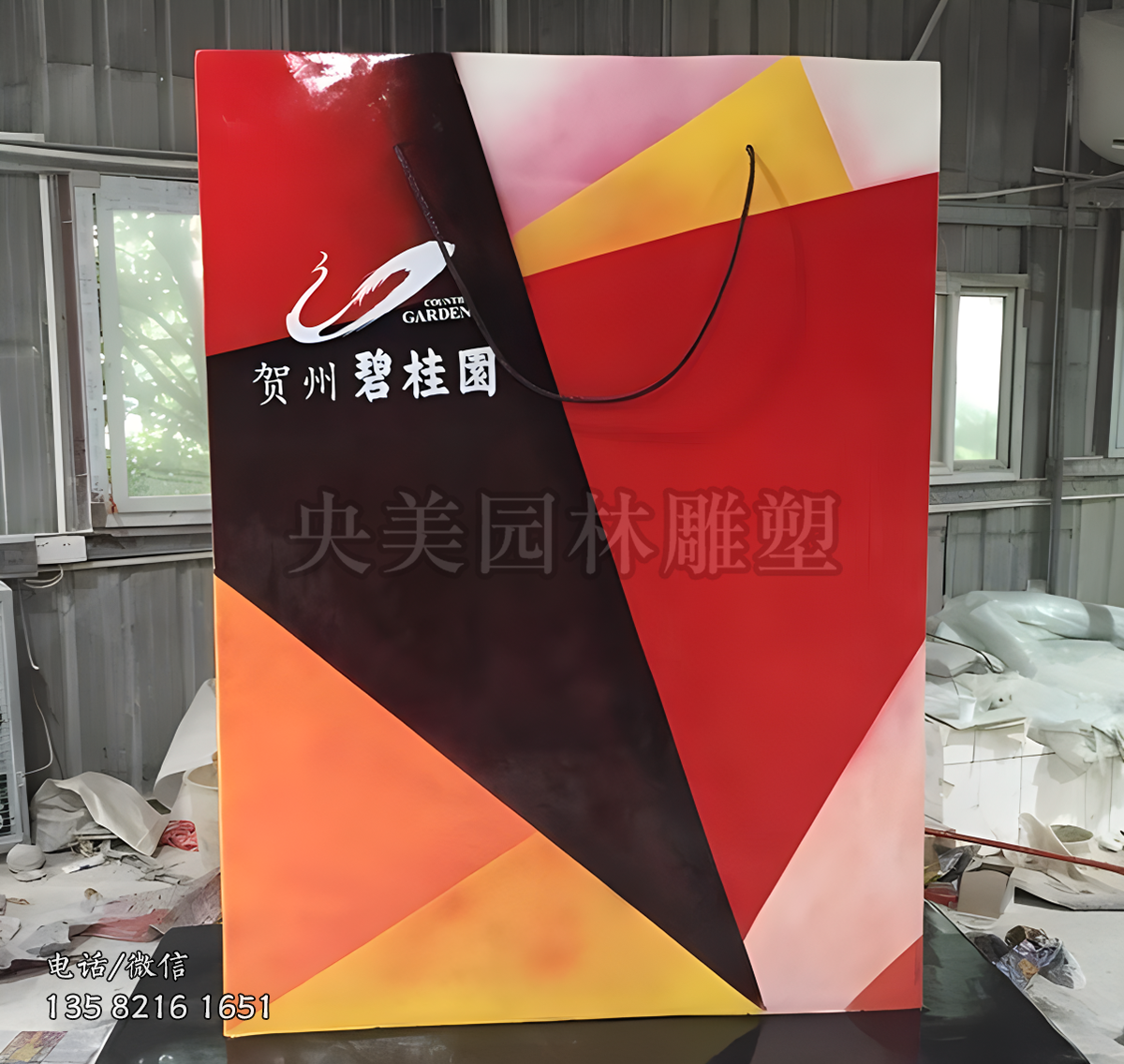 不锈钢彩绘购物袋雕塑